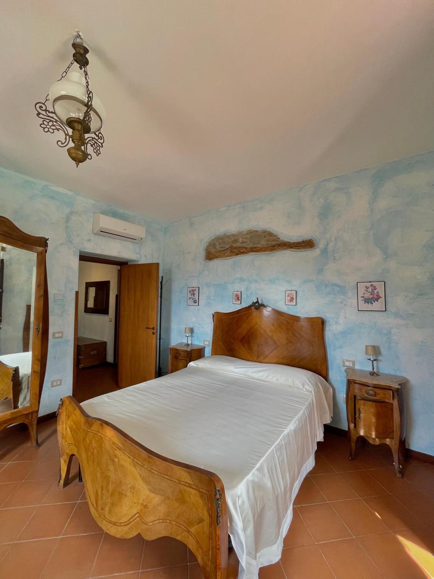 Agriturismo Piano Di Andrea Ostigliano ภายนอก รูปภาพ